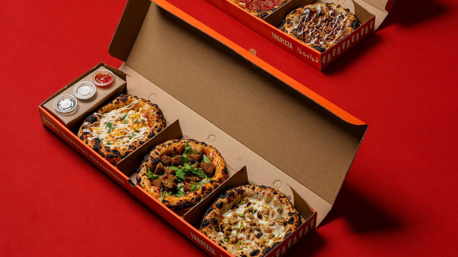 The Trapizza box with three Neapolitan pizzas